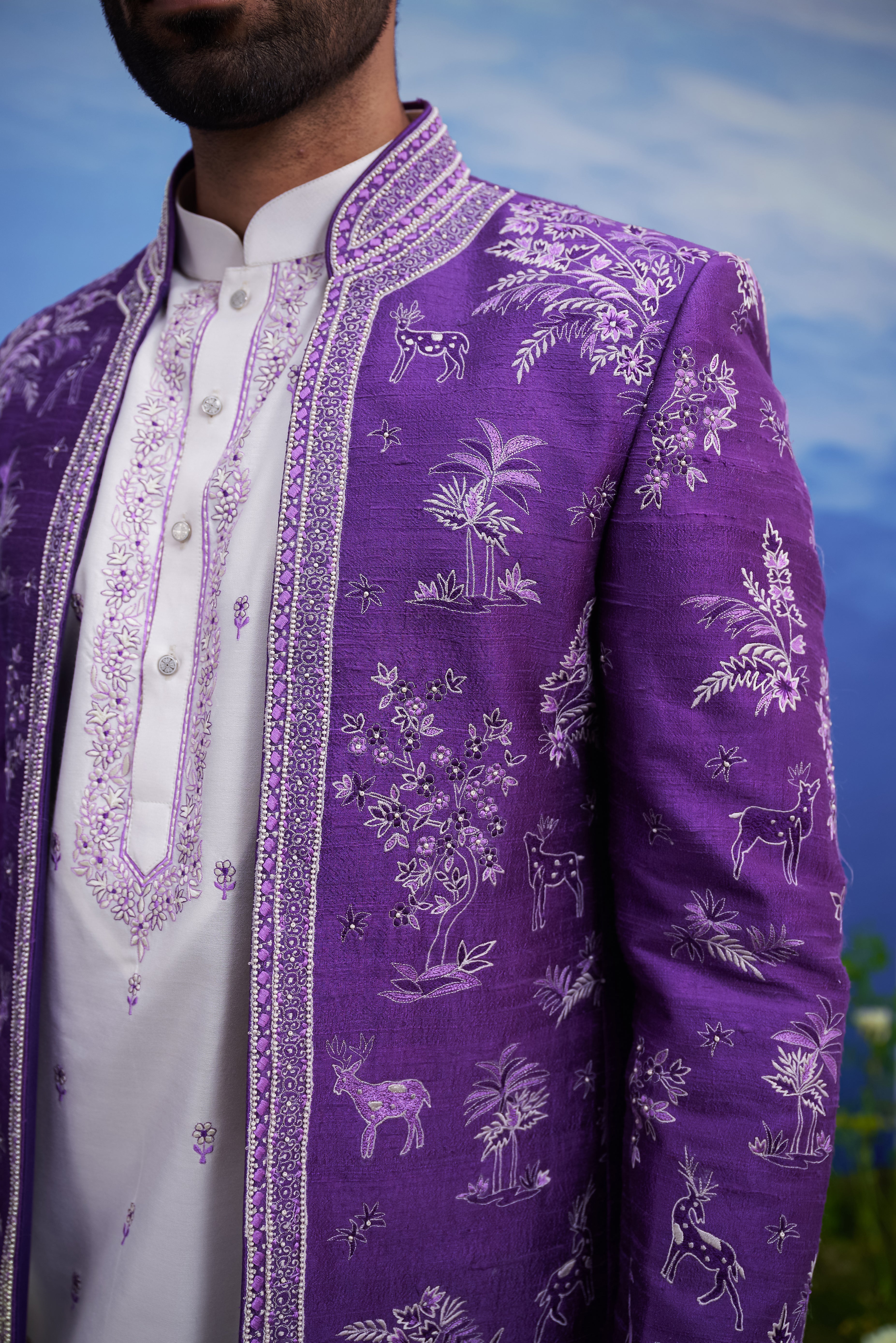 Close-up of the purple raw silk front open embroidered Bandhgala, highlighting the raw silk texture and embroidery.