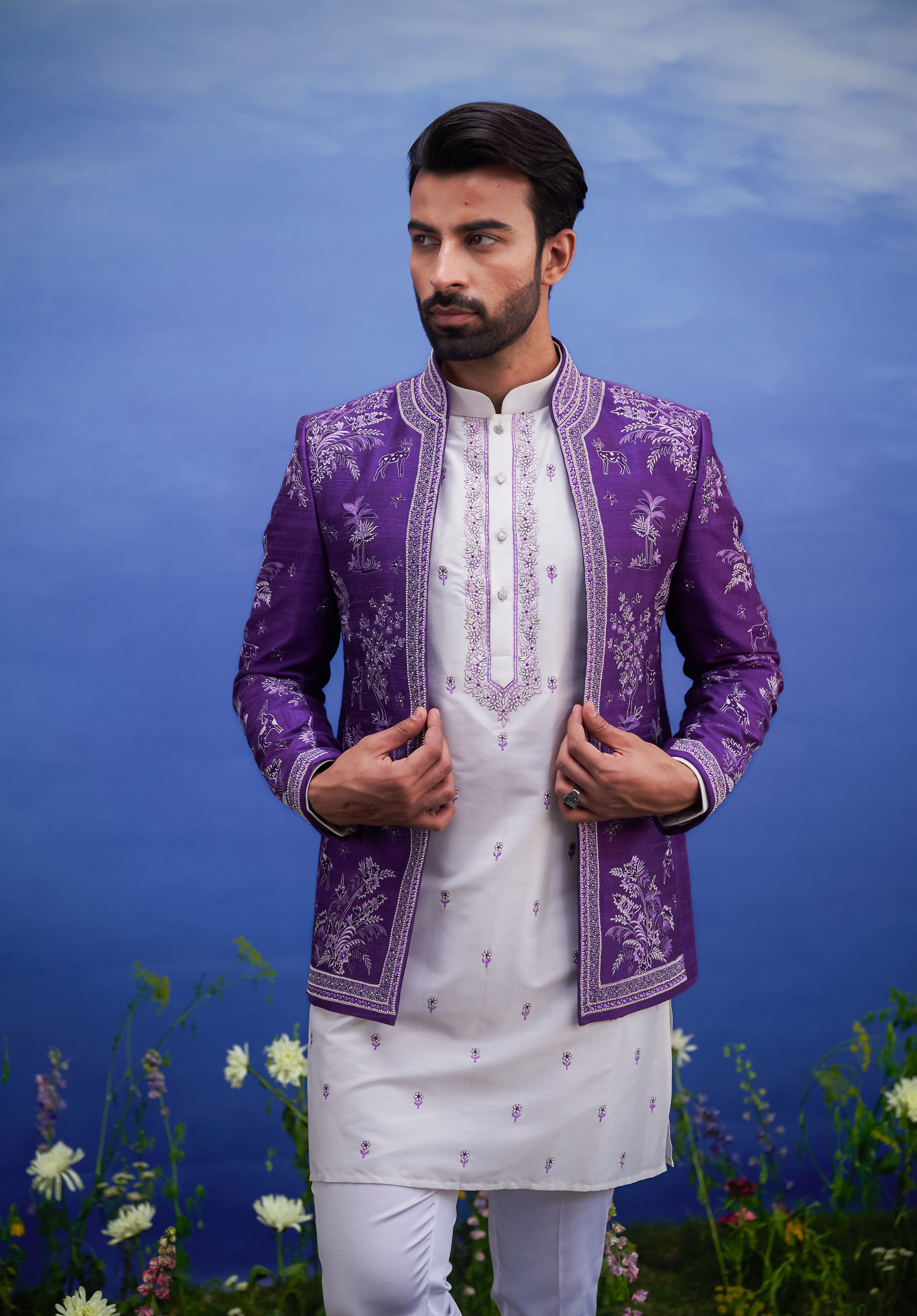 A detailed view of the purple raw silk front open embroidered Bandhgala, showcasing the raw silk fabric and embroidery