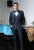 Navy designer suit with embroidered motif on Right side