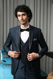 Teal designer suit with embroidered Blue satin shawl collar