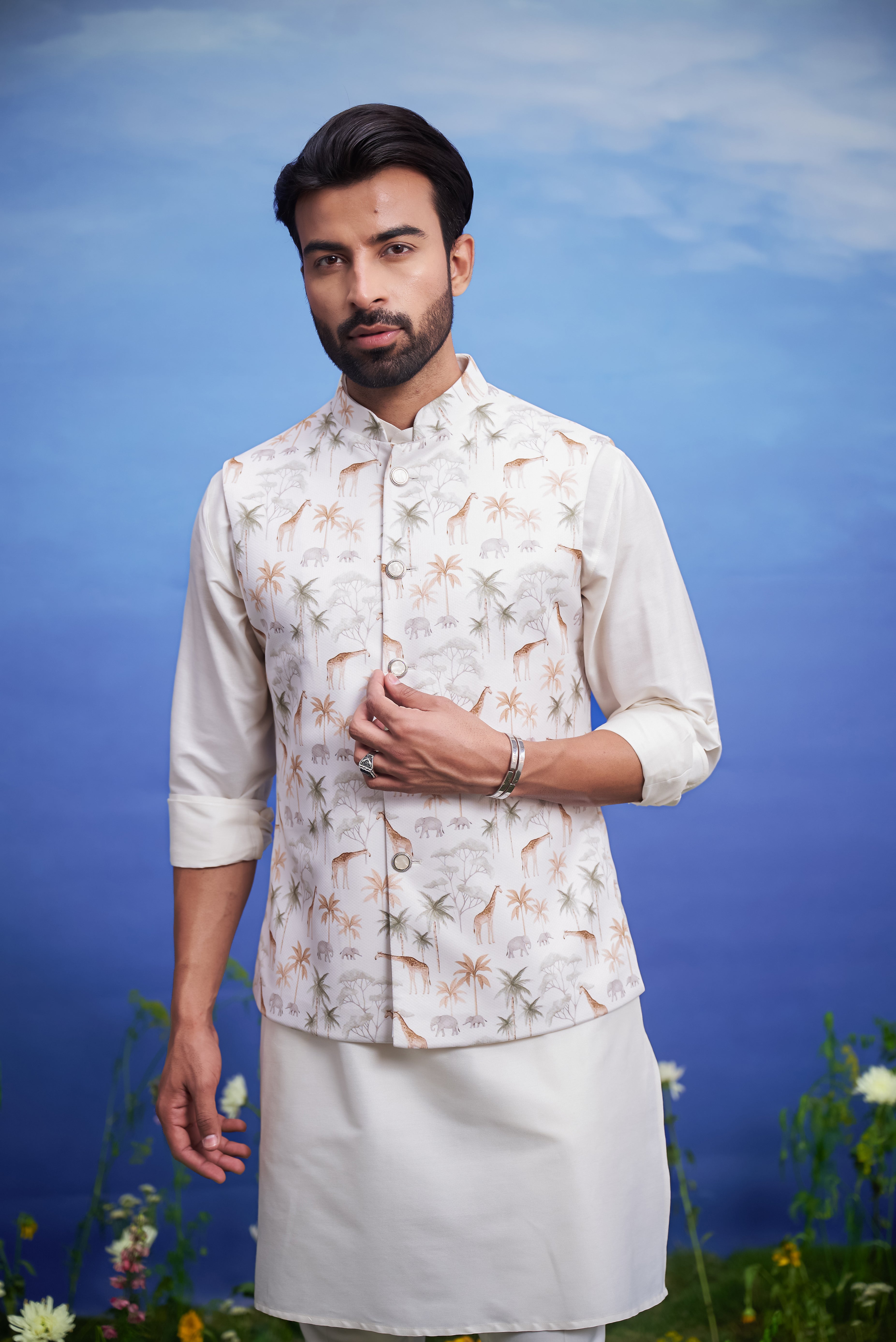 Animal motif cream Nehru jacket for men, made of knitted fabric with a regular fit.