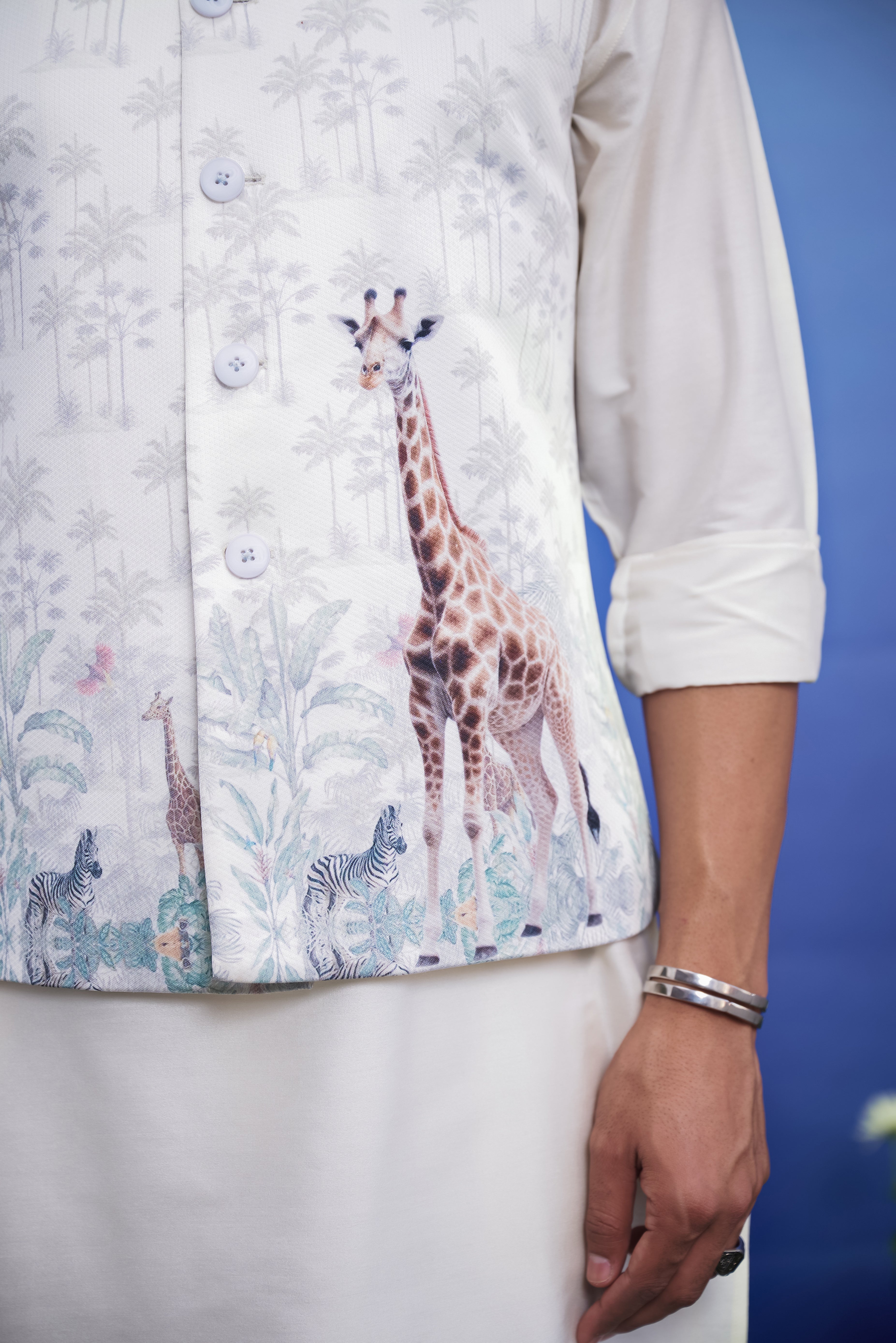 Men's Nehru jacket with an animal motif print, displayed on a product page with size options.