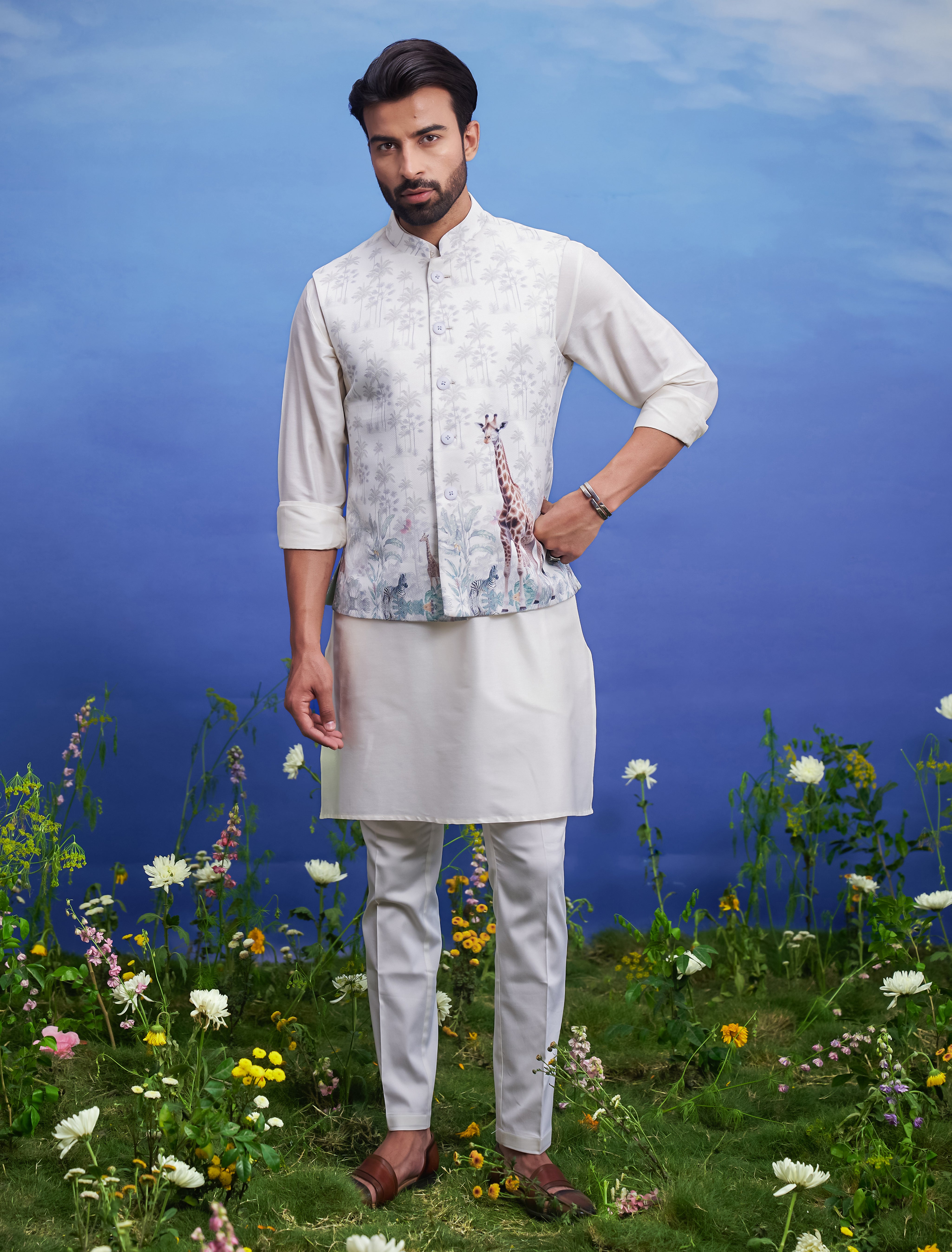 A Nehru jacket with an animal motif print, featuring a mandarin collar, ideal for men's party wear.
