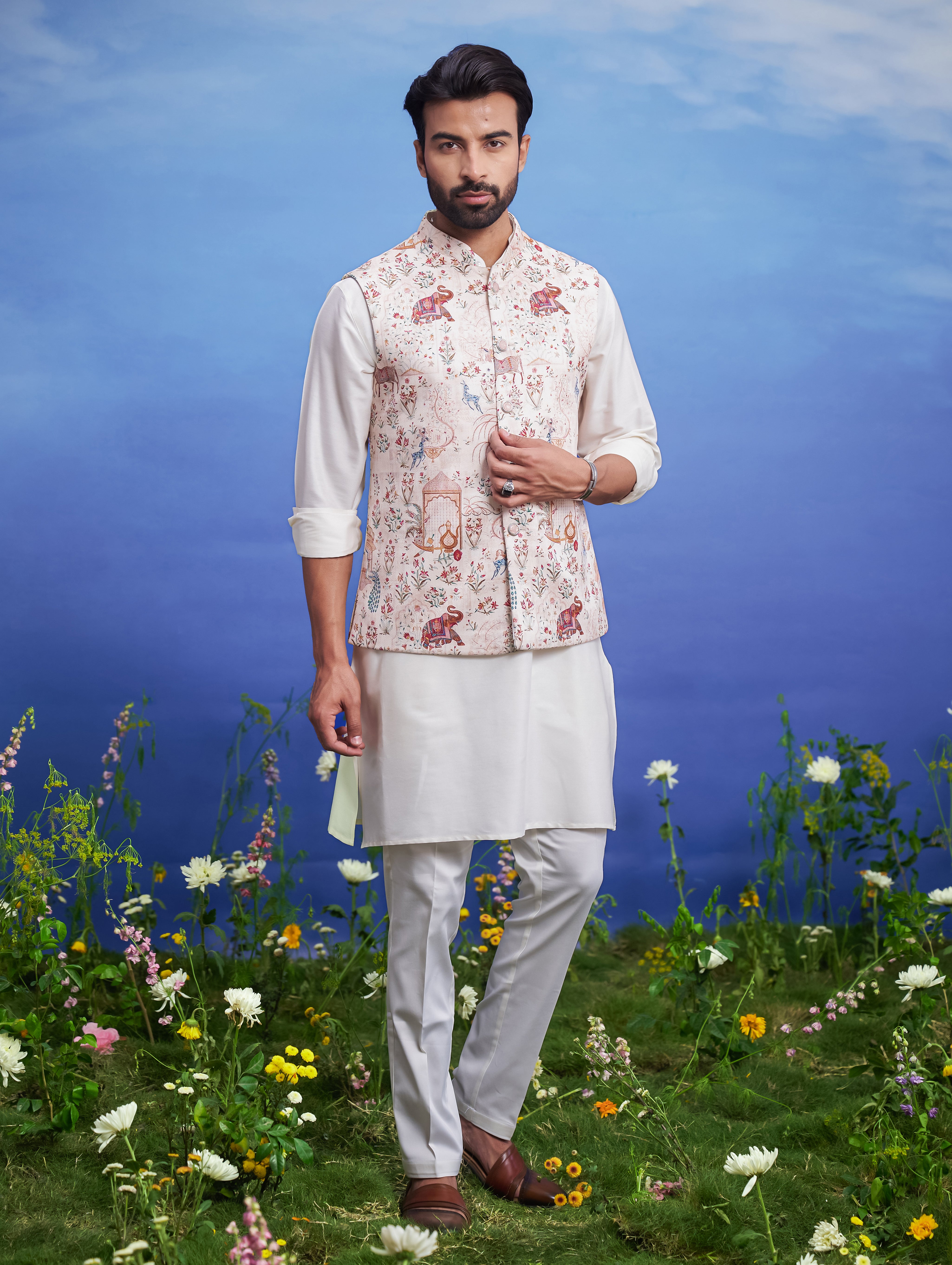 Animal motif printed Nehru jacket for men, blending modern prints with traditional Nehru jacket style, suitable for cocktail parties.