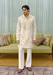 Beige embroidered kurta with wide trousers
