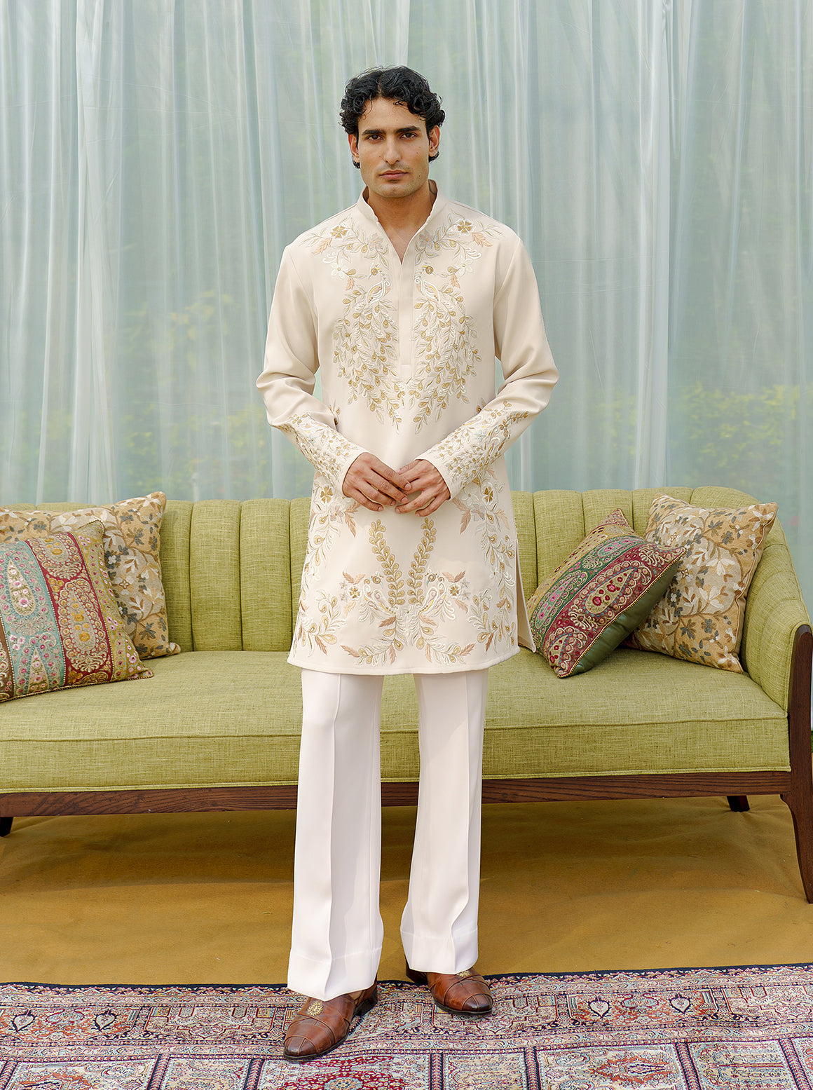 Beige embroidered kurta with wide trousers
