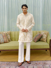 Beige embroidered kurta with wide trousers