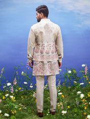 Men's beige kurta jacket set featuring a linen blend kurta, front open jacket, pajama, and pin.