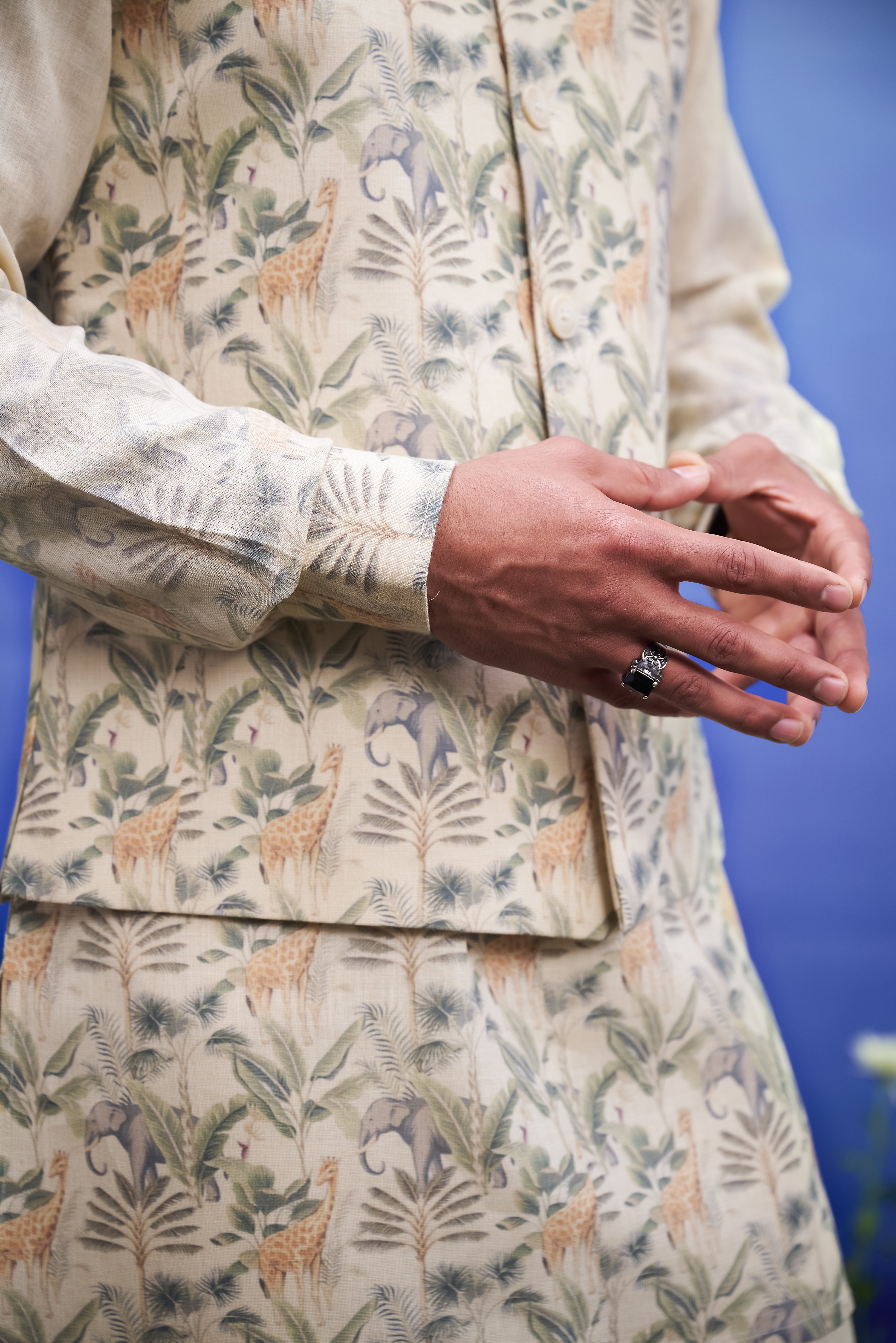 Men's beige kurta jacket set, displayed on a product page with size options.