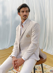 Beige blazer with designer motif