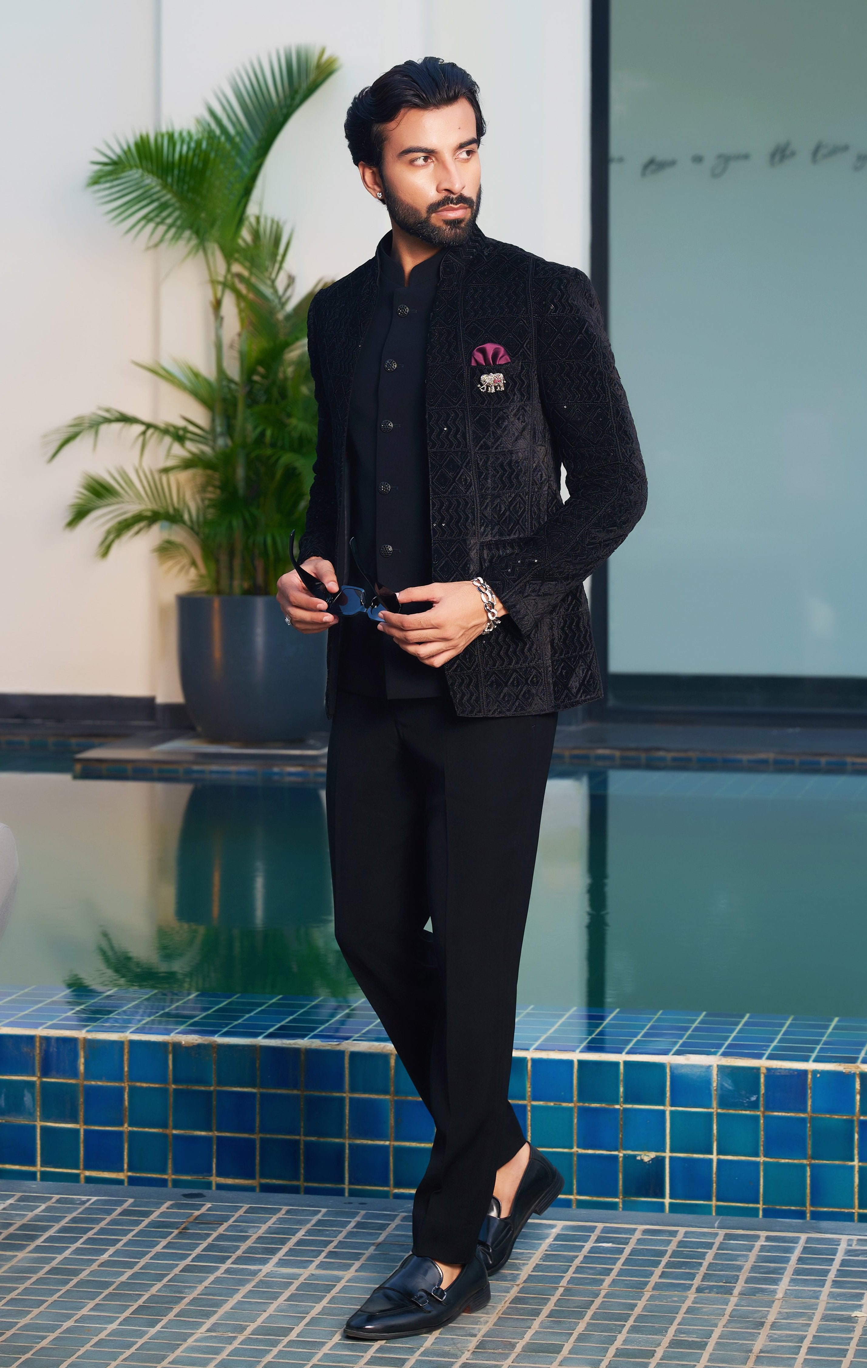 A bold black laser-cut open bandhgala, make a statement.
A timeless black laser-cut open bandhgala, a classic choice.