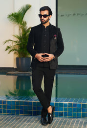 A luxurious black laser-cut open bandhgala, perfect for special occasions.
