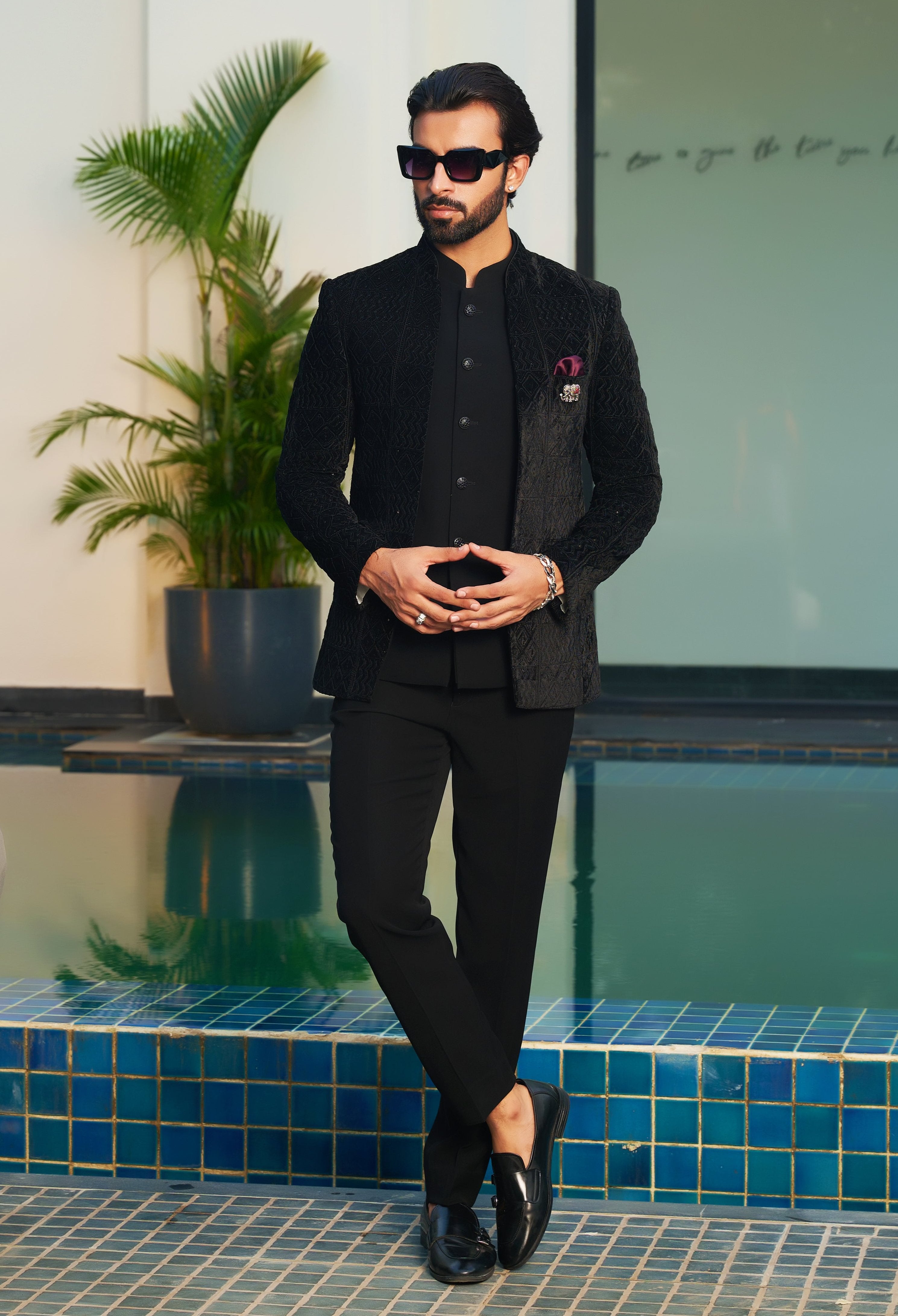 A luxurious black laser-cut open bandhgala, perfect for special occasions.
