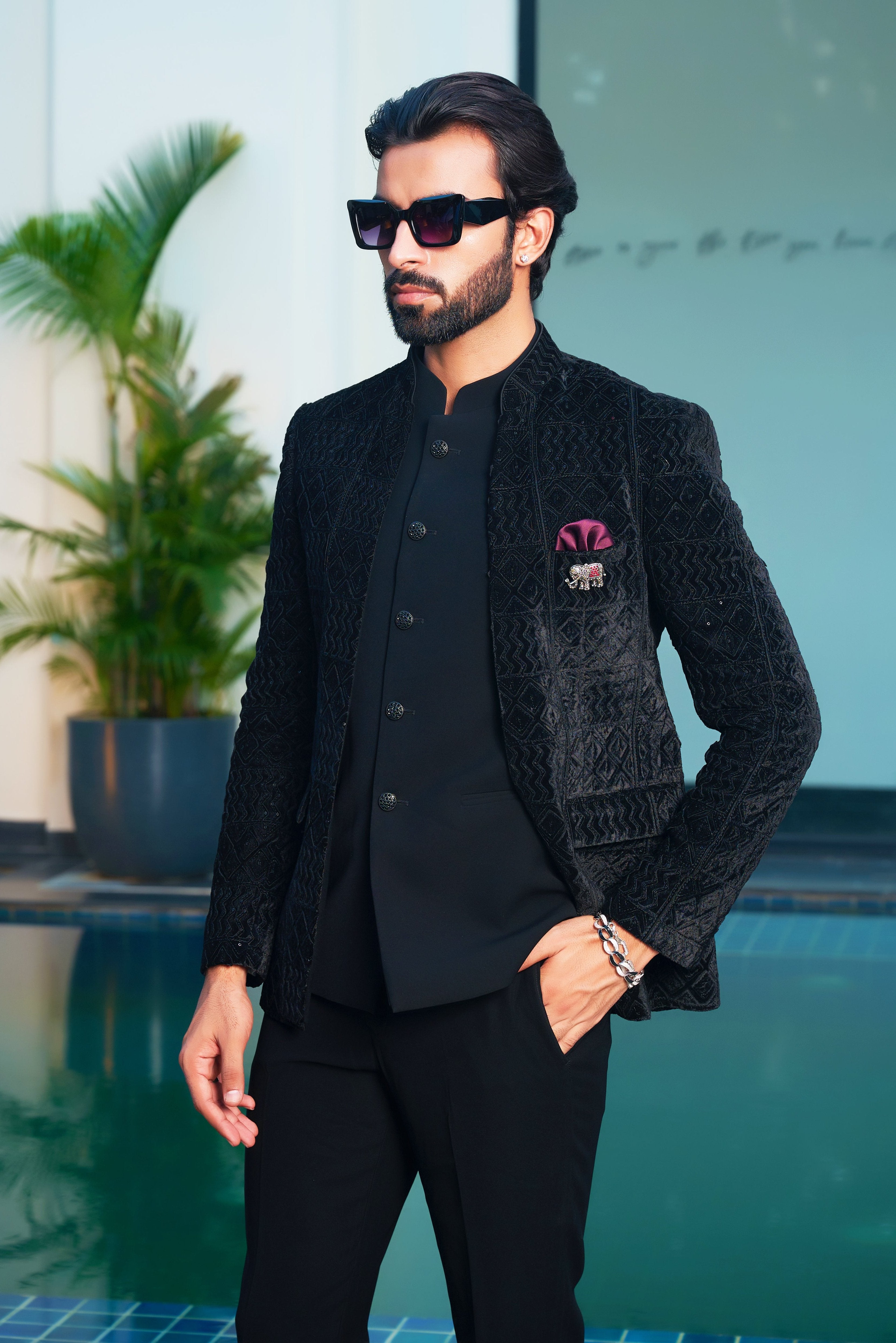 A versatile black laser-cut open bandhgala, suitable for various occasions.
