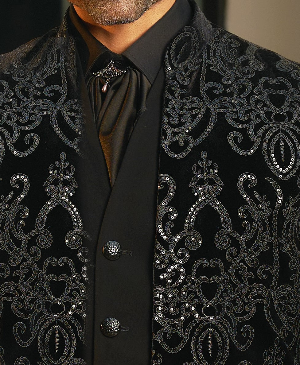 An elegant black velvet indo-western, a timeless classic.
