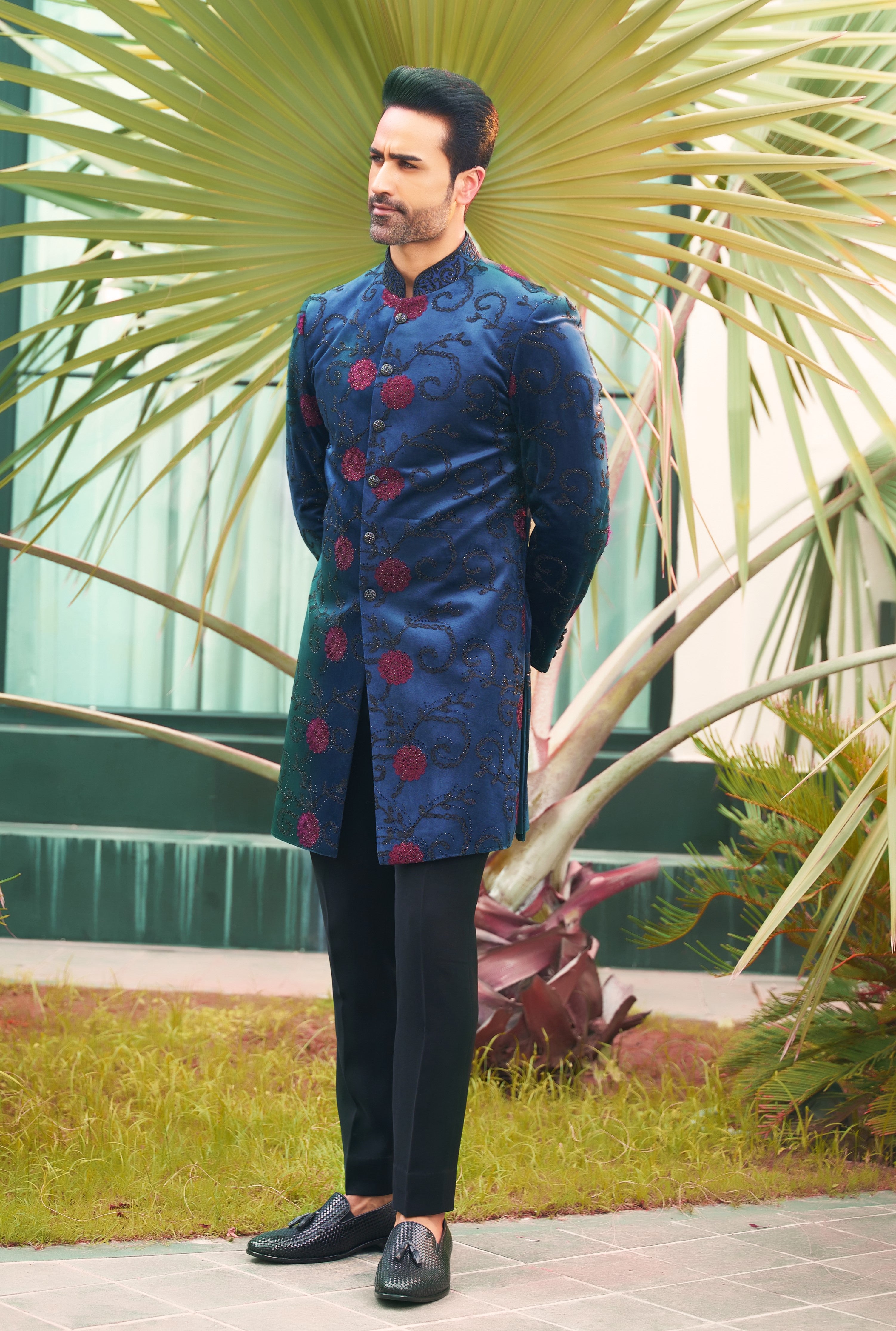 A versatile blue velvet indo-western with dori work, suitable for various occasions.
