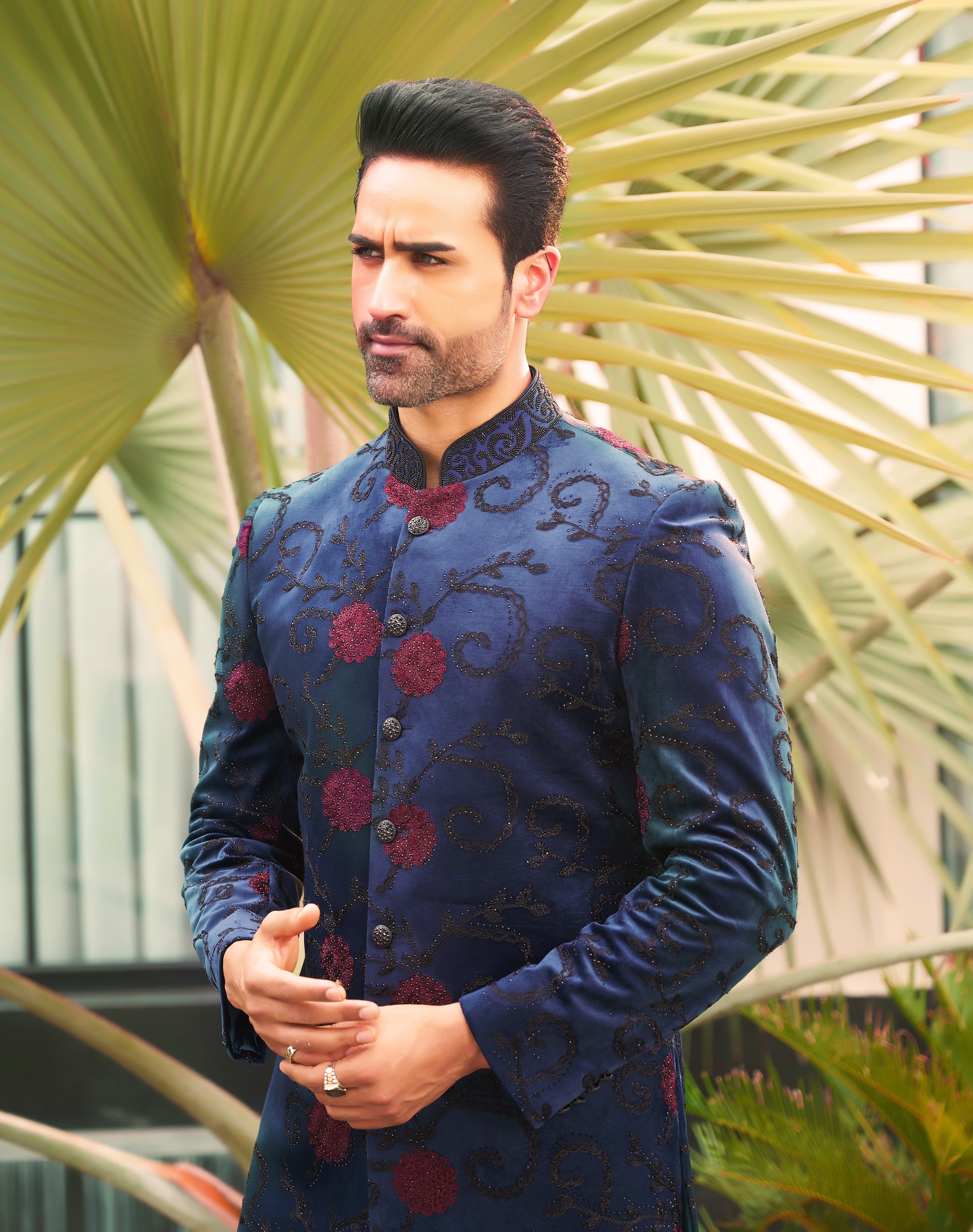 A trendy blue velvet indo-western with dori work, modern Indian fashion.
