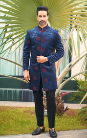 A luxurious blue velvet indo-western with dori work, perfect for weddings and parties.
