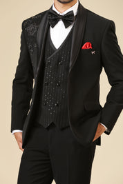 A stylish black embroidered tuxedo suit with double-breasted vest, perfect for weddings and formal occasions.
