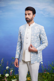 A sophisticated light blue Bandhgala suit with an open front and linen blend fabric, ideal for formal occasions.
