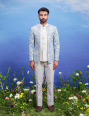 Light blue linen open Bandhgala suit, men's ethnic formal wear, featuring a linen blend Bandhgala, sleeveless jacket, trousers, and pin.