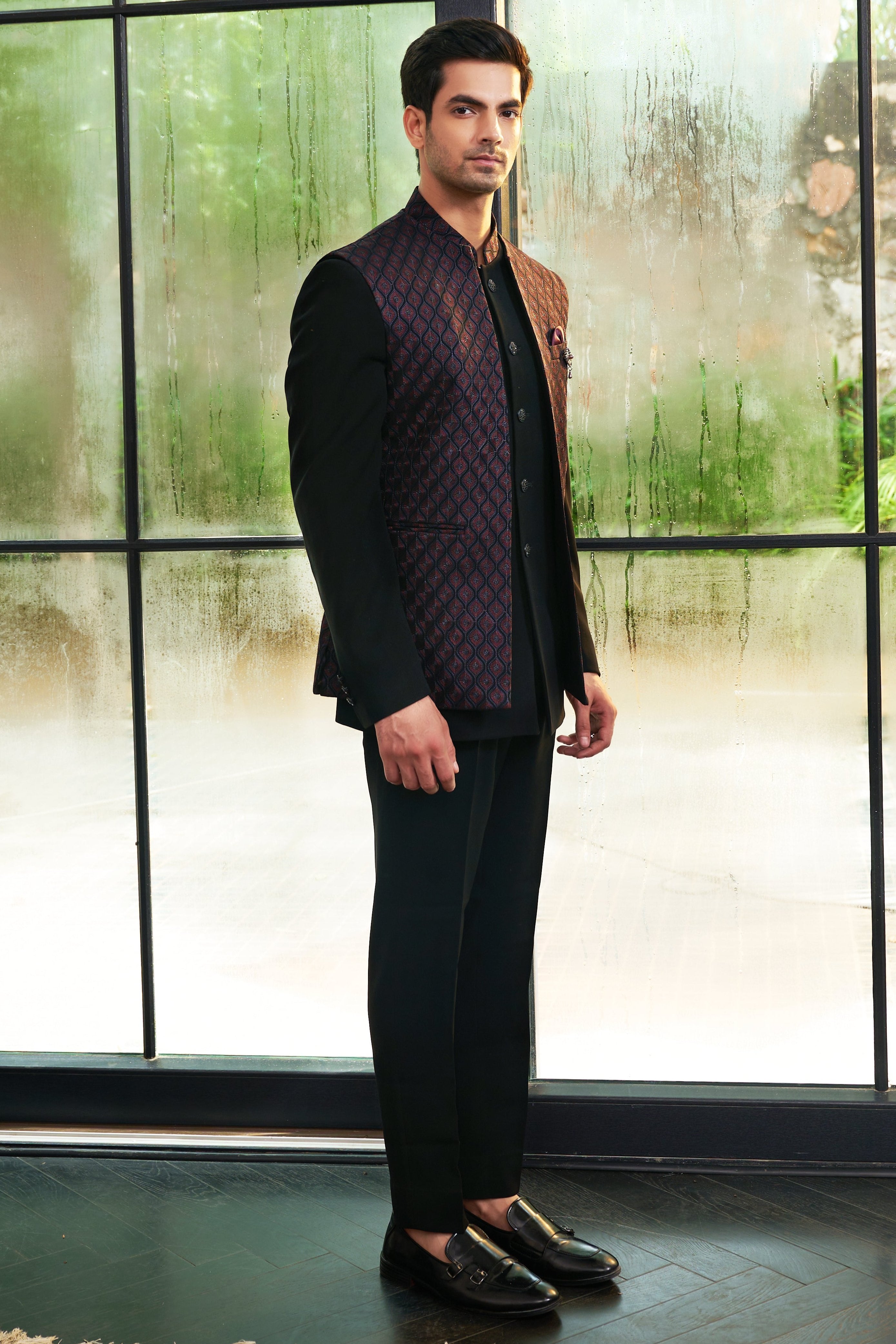 A stylish maroon embroidered open jacket bandhgala, perfect for festive occasions.
