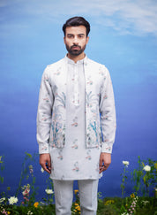 Men's mint green kurta jacket set, displayed on a product page with size options.