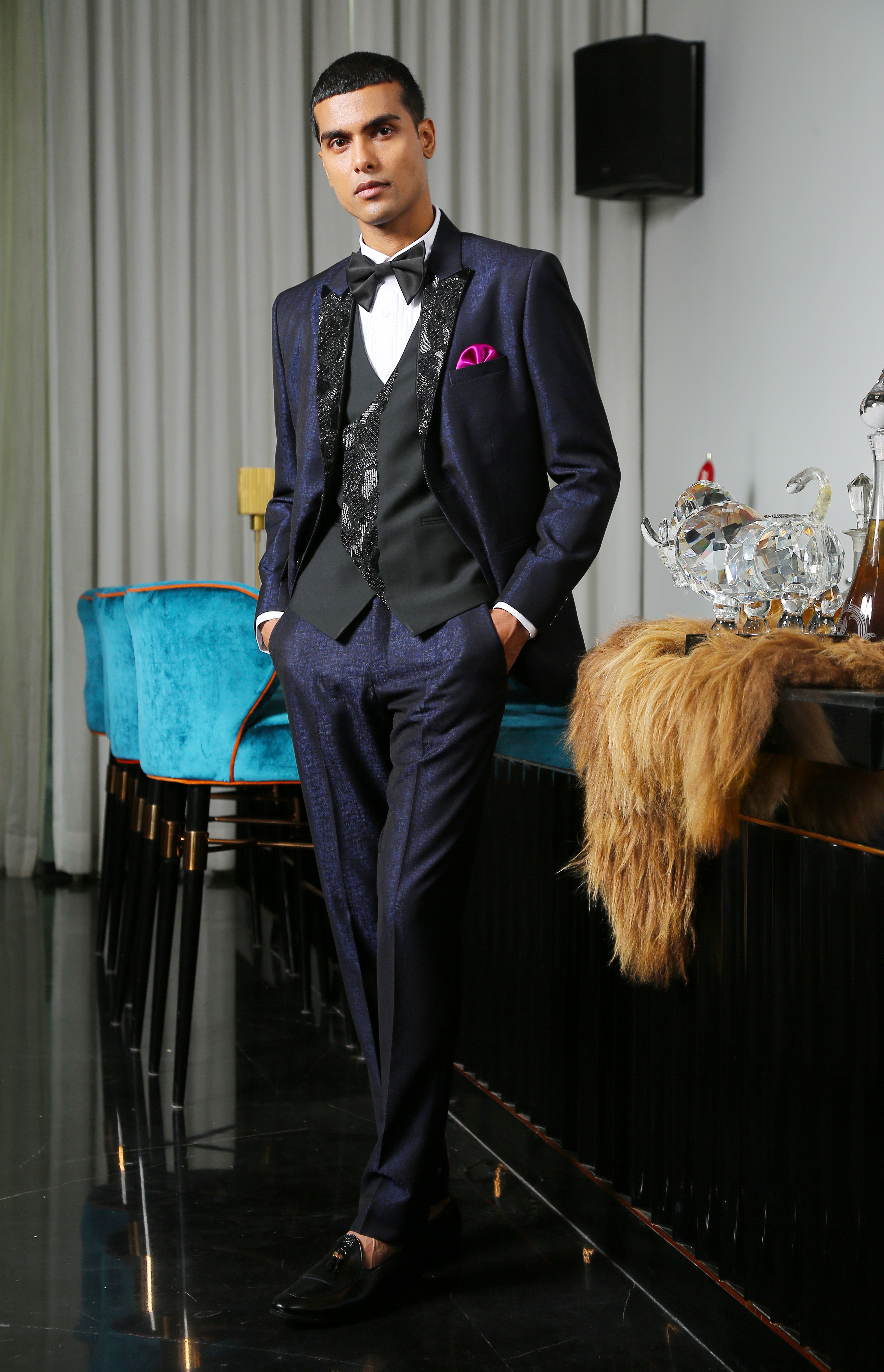 A trendy navy blue jacquard designer suit with embroidery, urban style.
