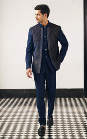 A regal navy blue embroidered open jacket bandhgala, a majestic ensemble.
