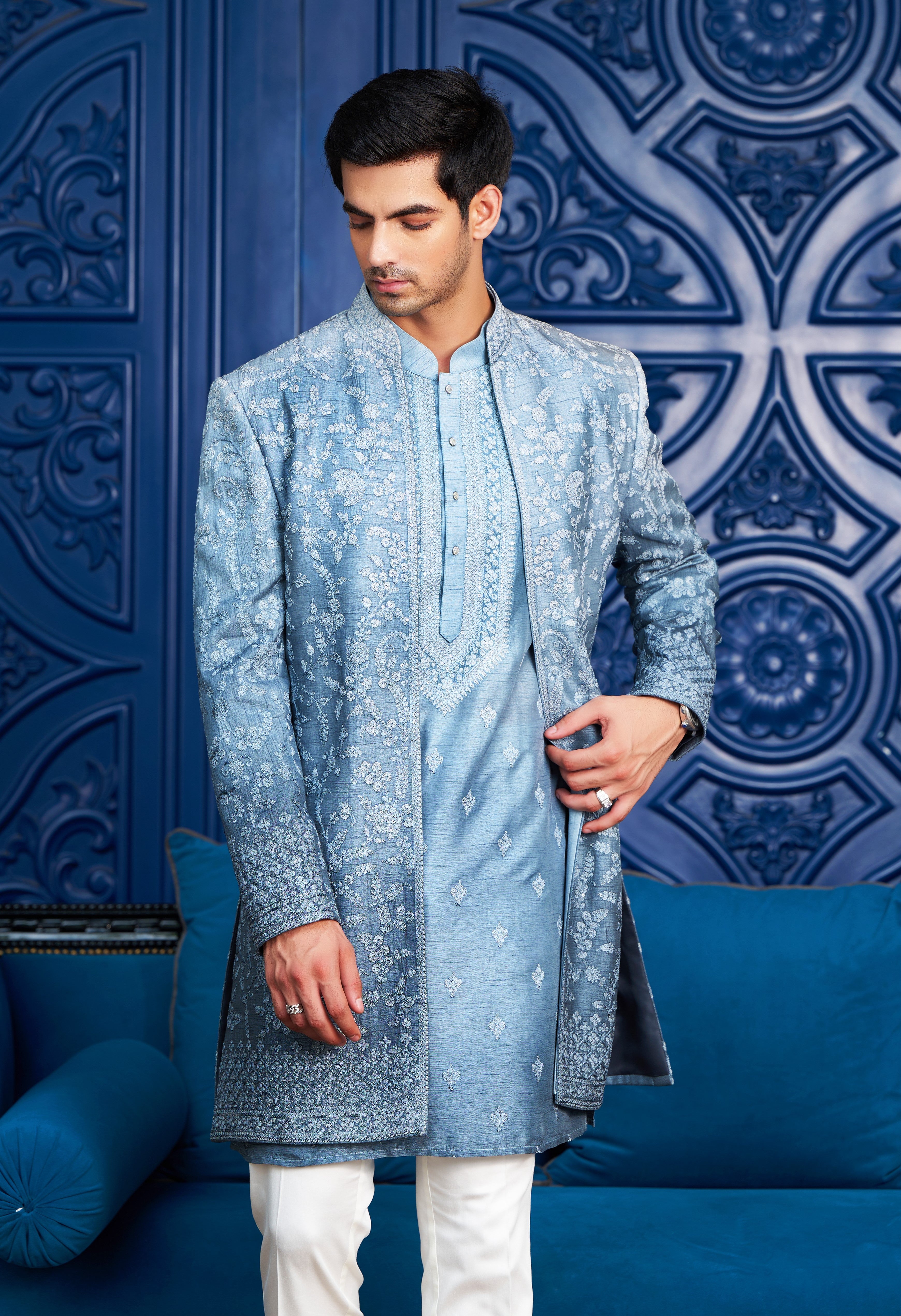 A versatile blue open indo-western with dori work, suitable for various occasions.
