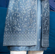 An elegant blue open indo-western, traditional Indian attire.
