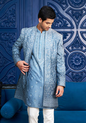 A stylish blue open indo-western with dori work, perfect for weddings and parties.
