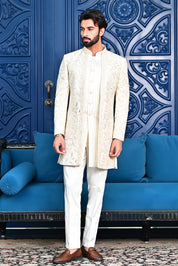 A stylish off-white open indo-western with dori work, perfect for weddings and parties.
