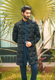 A stylish teal open indo-western with sleeveless jacket, perfect for weddings and parties.
