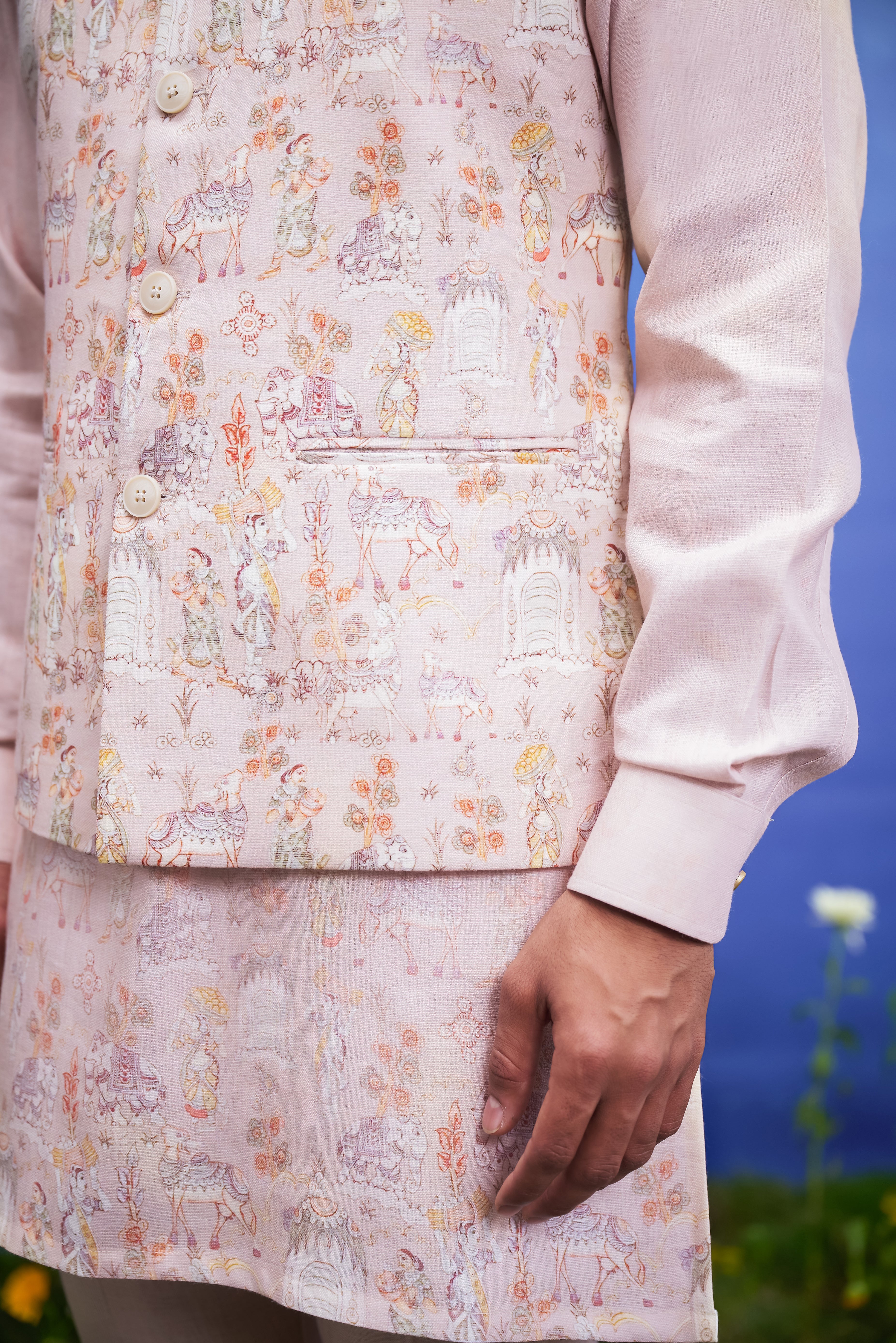 Close-up of the peach linen kurta jacket set, highlighting the linen texture.