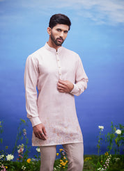 Peach linen kurta set, men's ethnic wear, featuring a linen blend kurta and pajama.