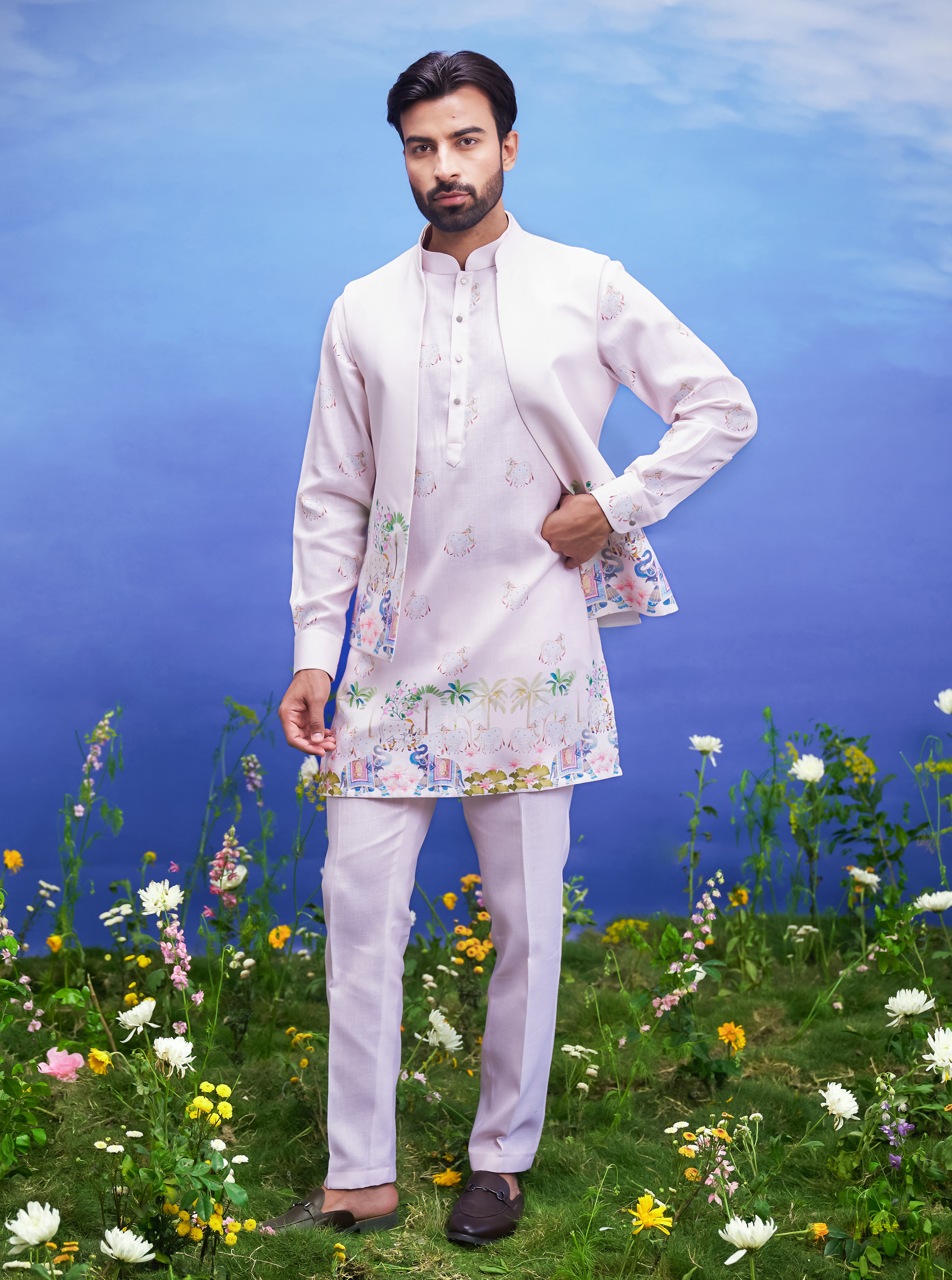 Men's pink kurta jacket set featuring a linen blend kurta, jacket, pajama, and pin.