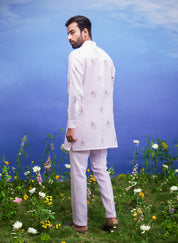 Men's pink kurta set, a complete ethnic outfit made from linen blend fabric, displayed on a product page.