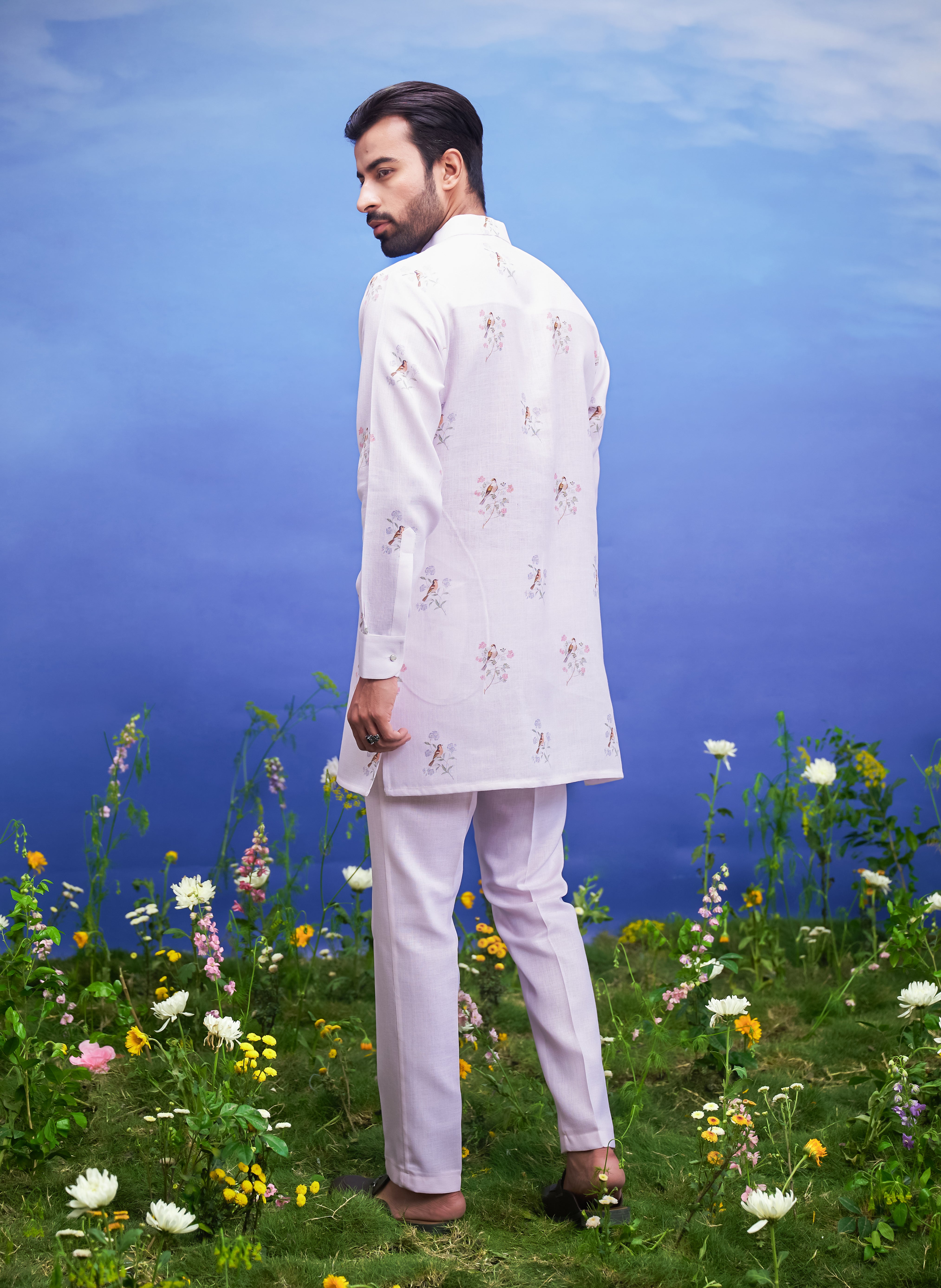 Men's pink kurta set, a complete ethnic outfit made from linen blend fabric, displayed on a product page.