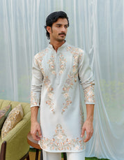 Sea green embroidered kurta with wide trousers