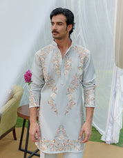 Sea green embroidered kurta with wide trousers