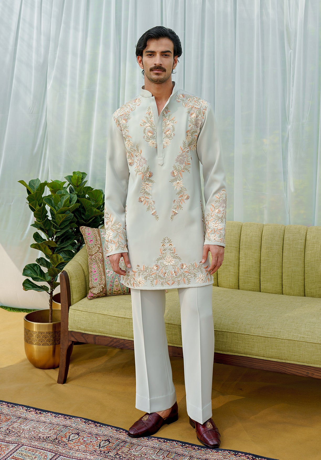Sea green embroidered kurta with wide trousers