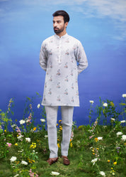 A detailed view of the mint green linen kurta set, showcasing the fabric quality and design elements.