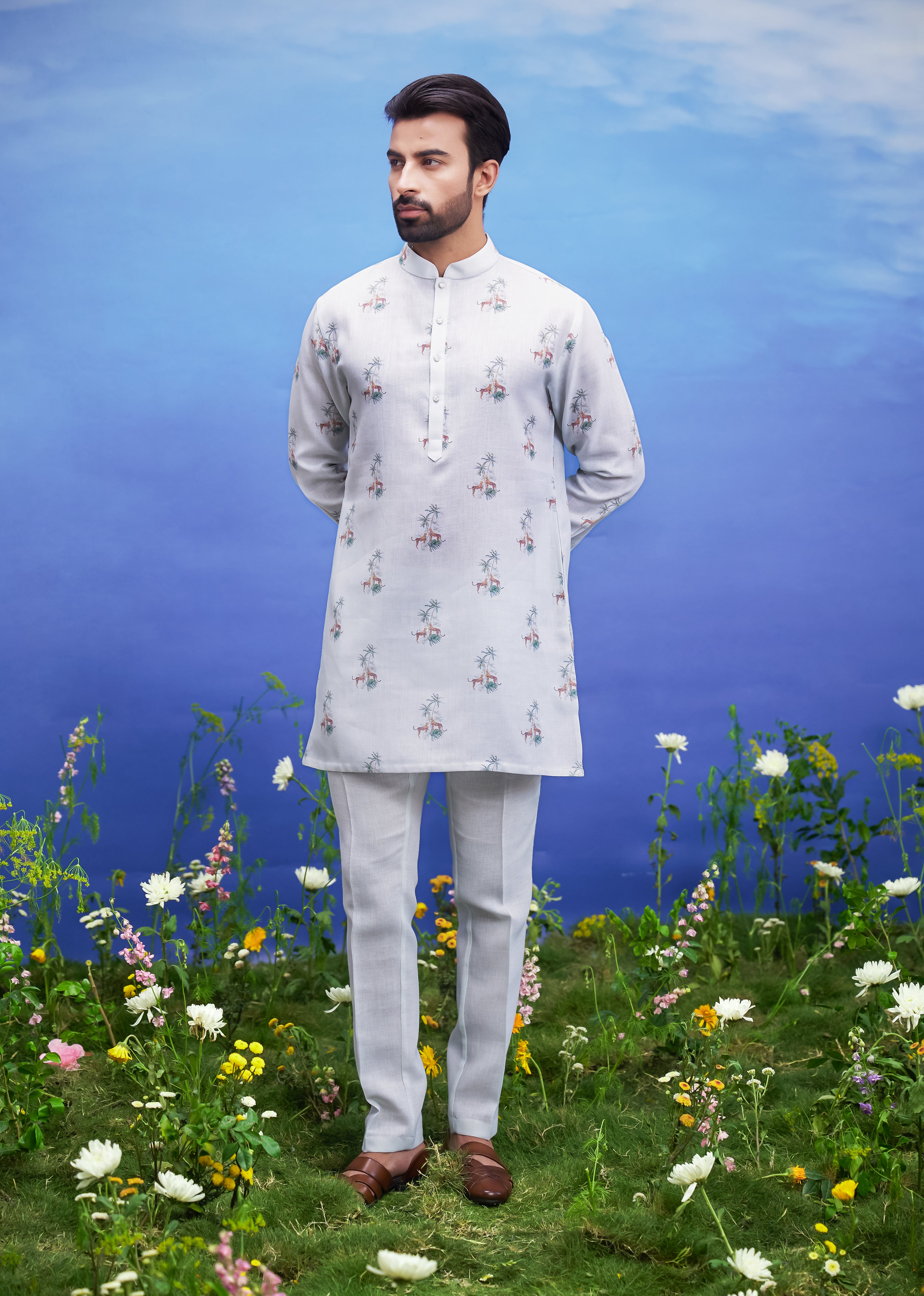 A detailed view of the mint green linen kurta set, showcasing the fabric quality and design elements.