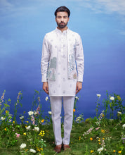 A detailed view of the printed white kurta jacket set, showcasing the floral print and fabric quality.