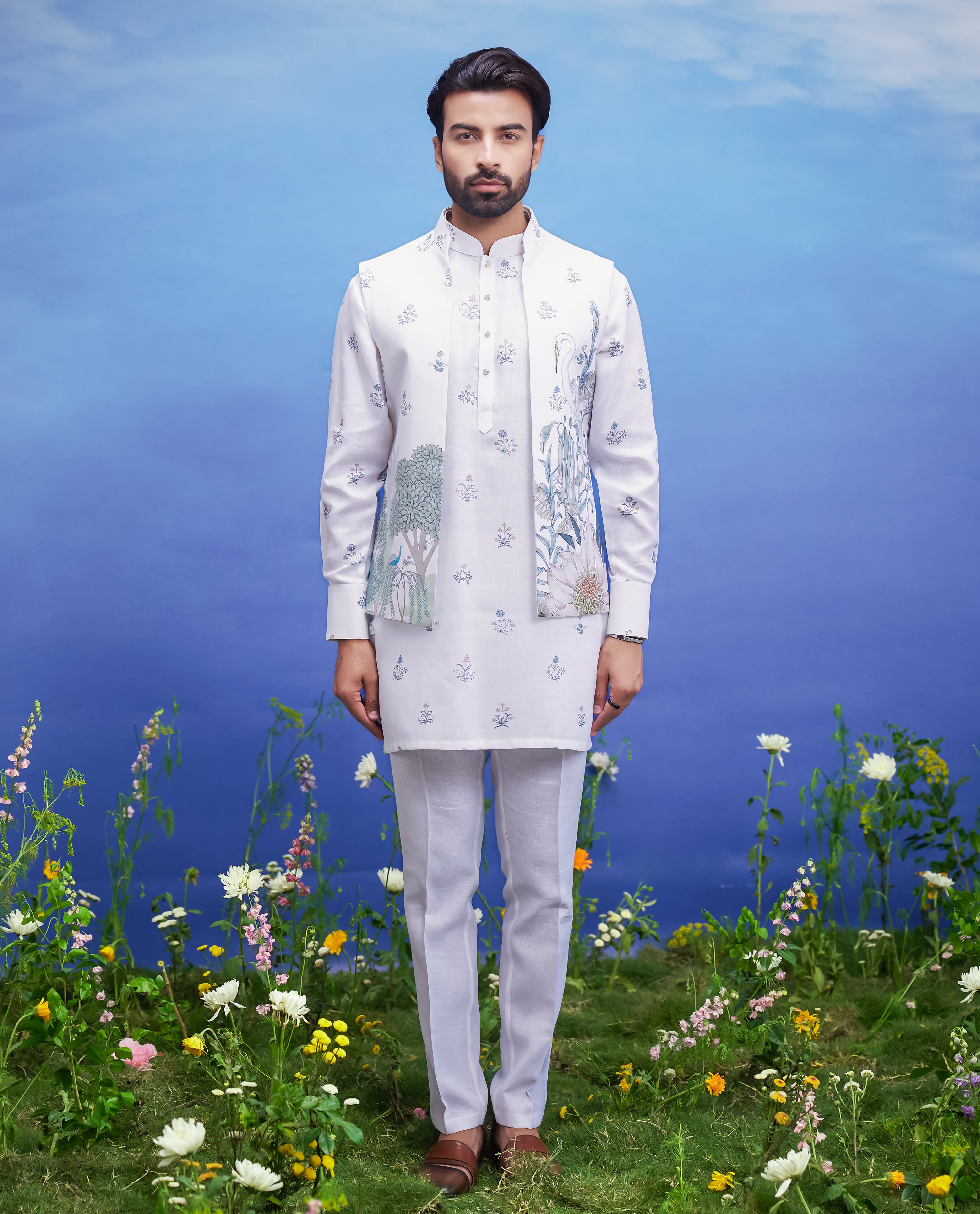 A detailed view of the printed white kurta jacket set, showcasing the floral print and fabric quality.
