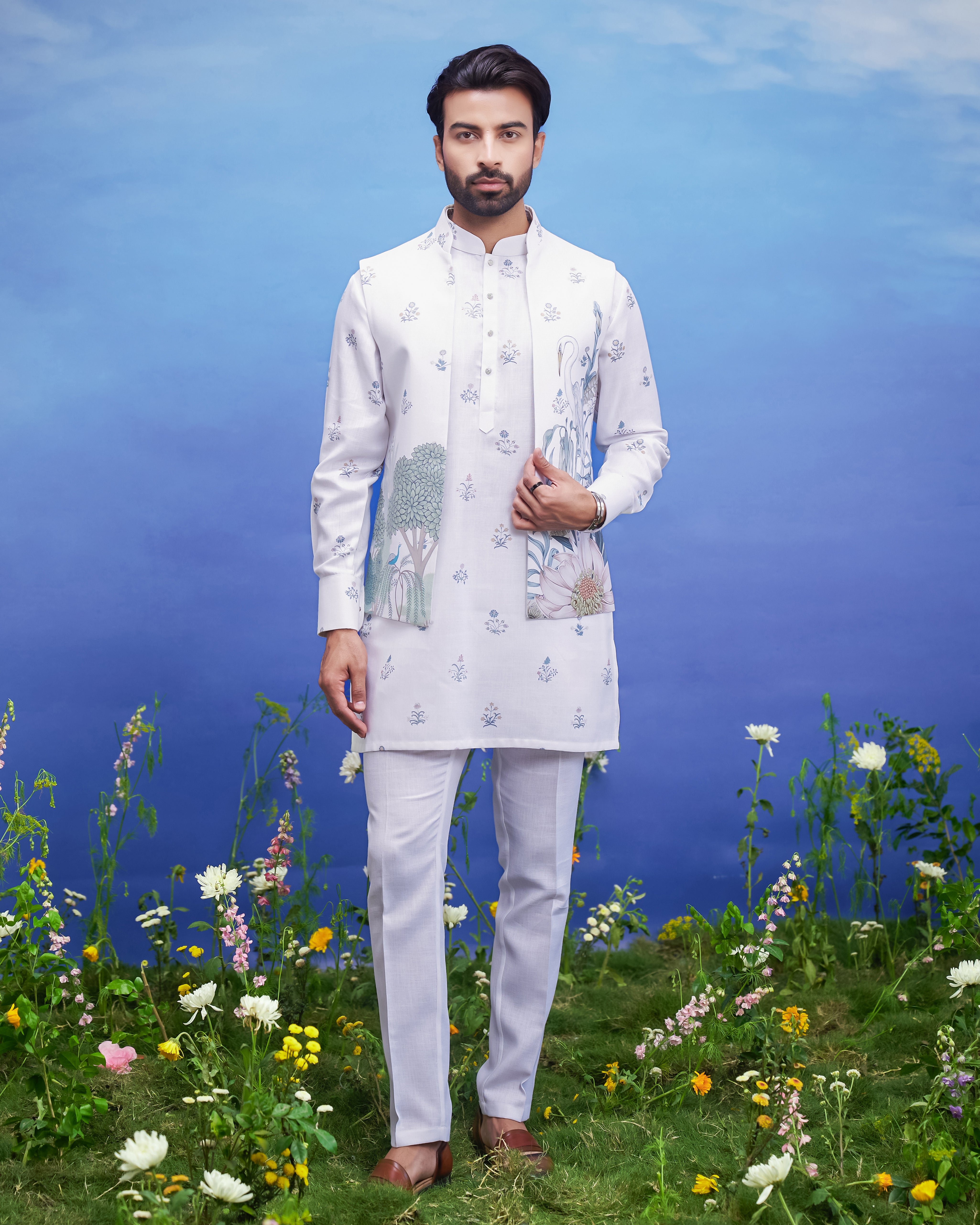 Printed white kurta jacket set, men's ethnic wear, featuring a blended silk kurta, jacket, and pajama.