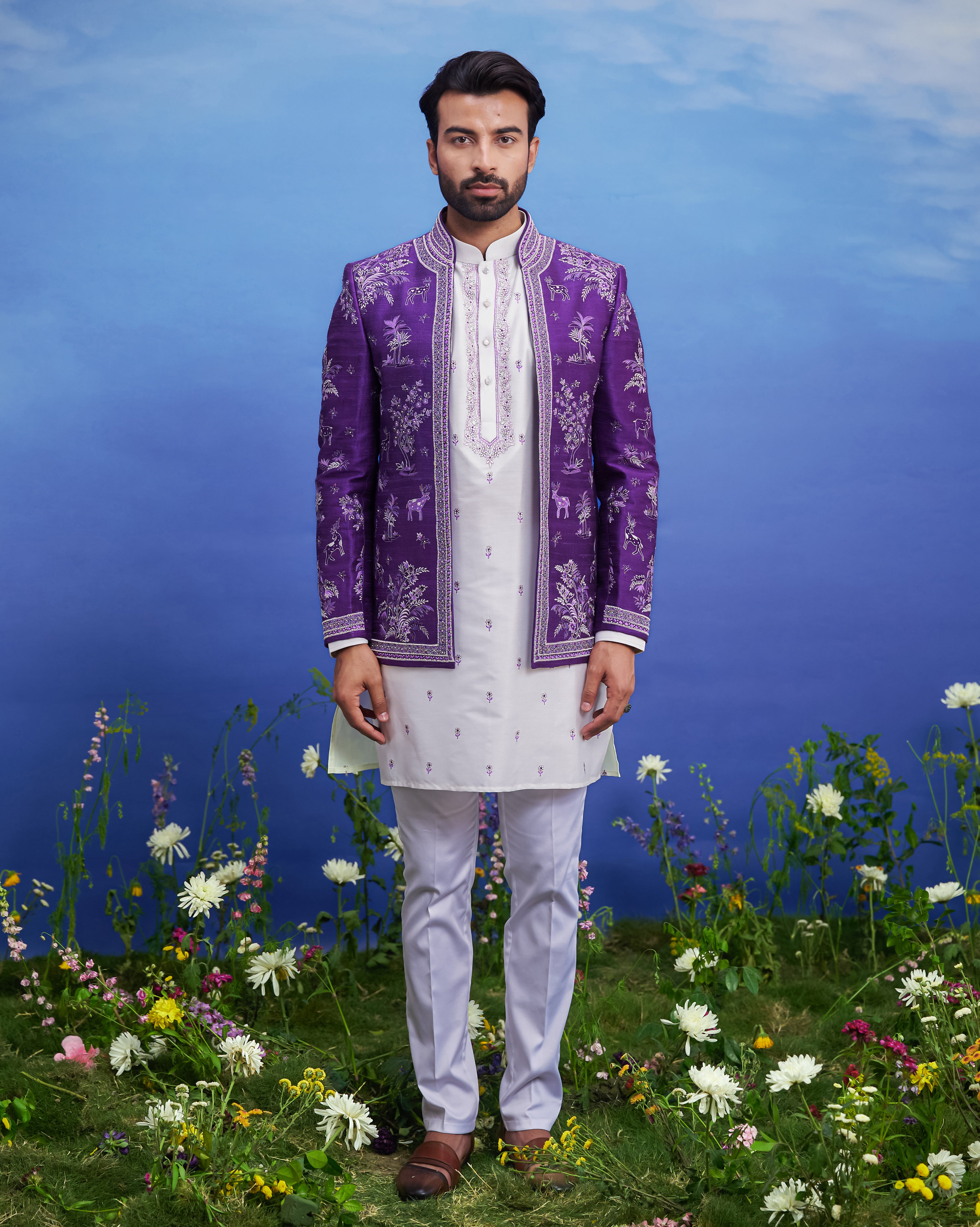 Men's purple Bandhgala, suitable for festivals and cultural events, featuring embroidery, available in sizes 36 to 44 and custom.