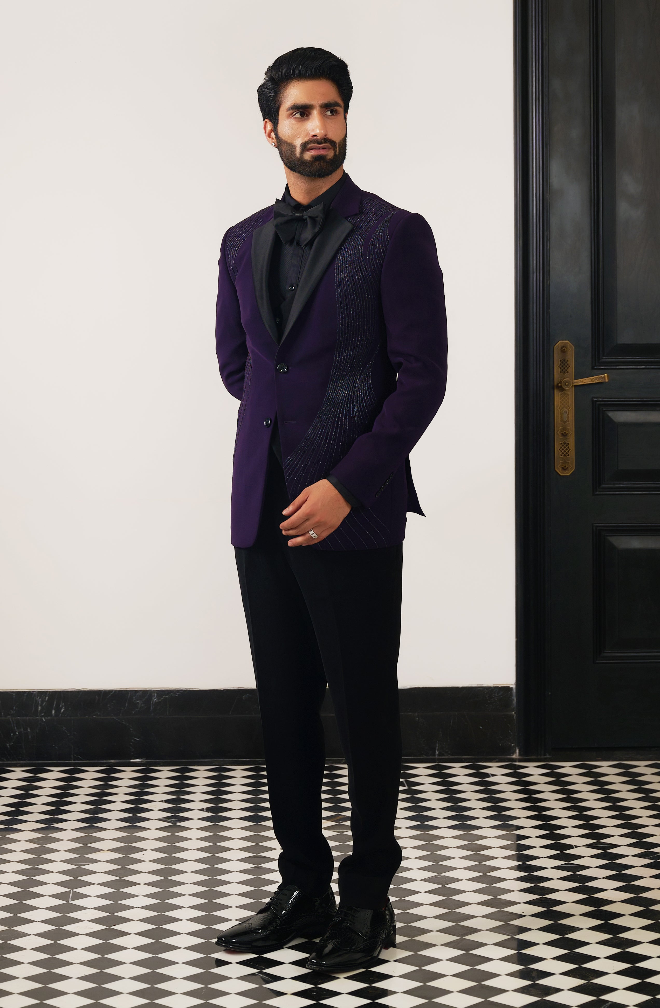 A versatile purple suit with front designer work, suitable for various occasions.
