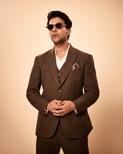 Brown pinstripe 3-piece suit inspired by Rajkummar Rao, featuring a tailored suit, same waistcoat, and trousers in premium wool-feel fabric with a sharp modern fit, ideal for weddings, formal events, business wear, and celebrations.